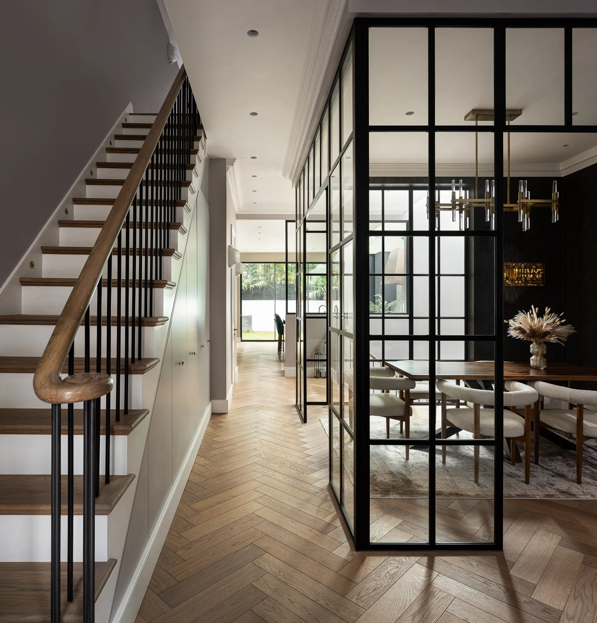 Hall and glazed dining room seen from the stair