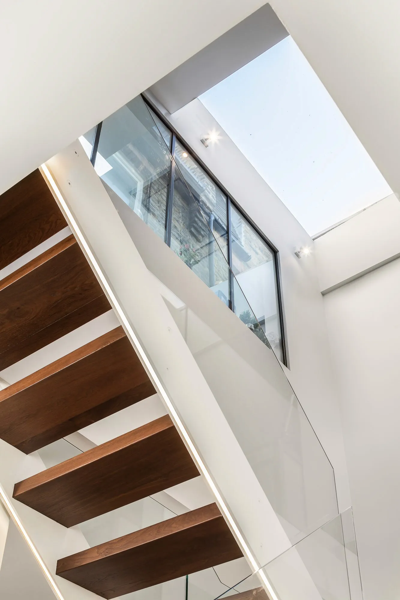 Open-tread stair below the rooflight