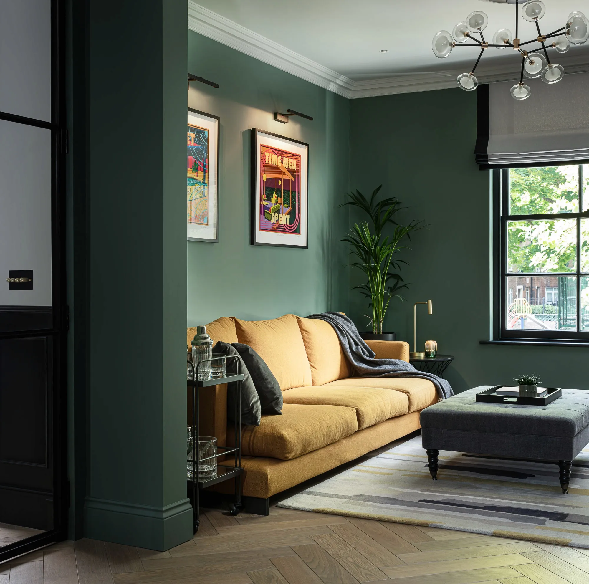 Green Smoke reception room with yellow sofa