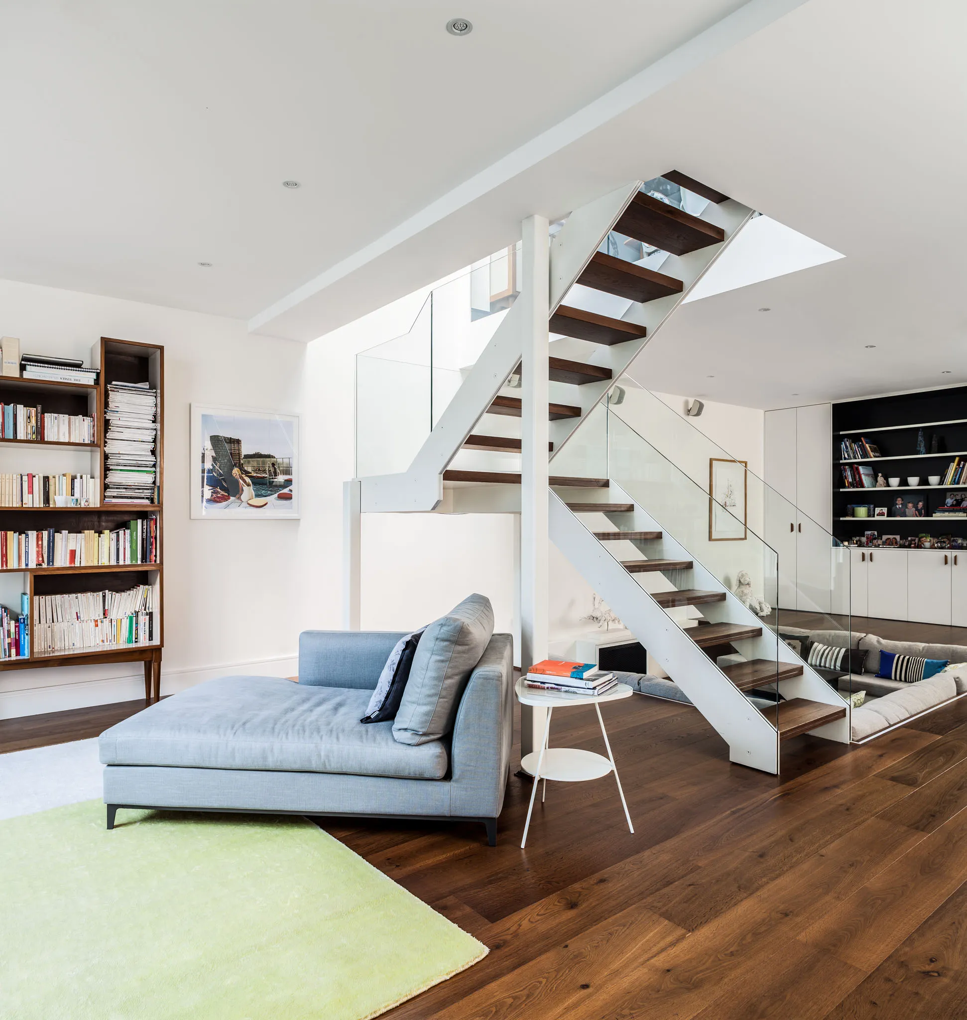 Living room beside the open cantilevered stair
