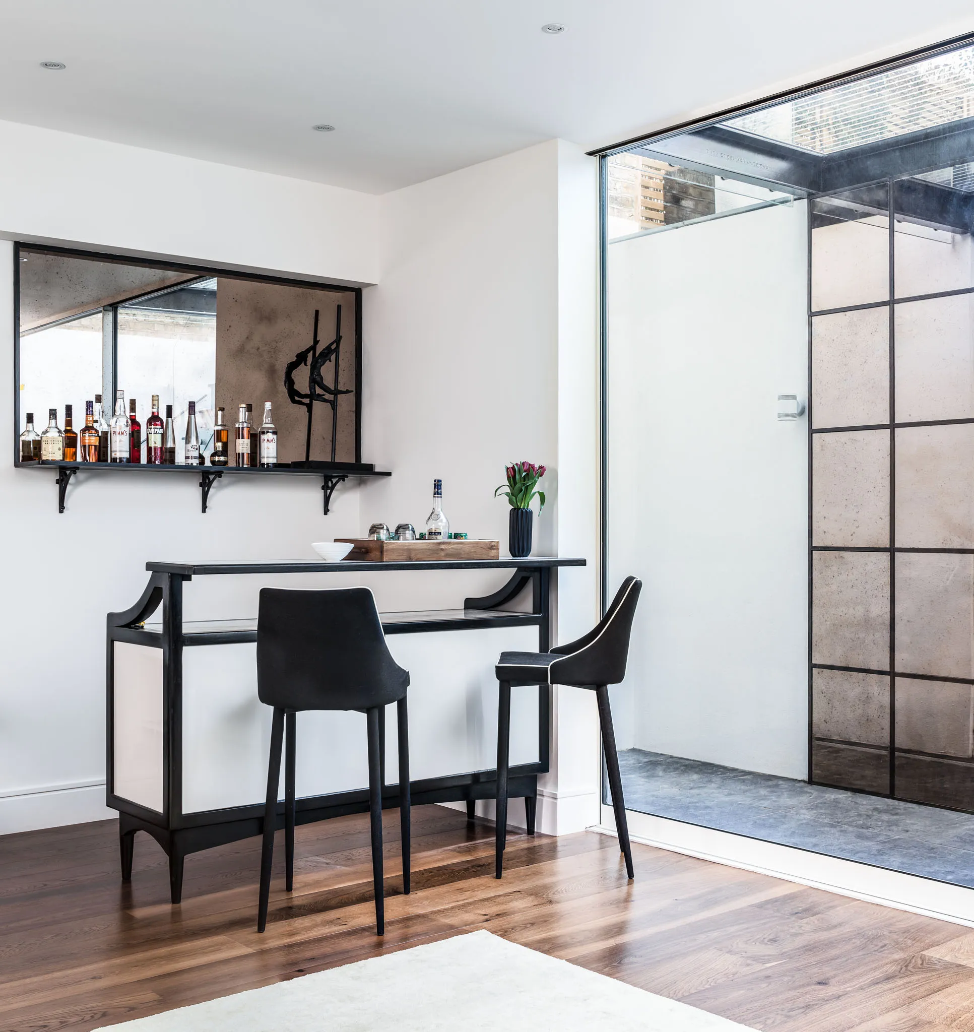 Bar counter beside the steel-framed screen