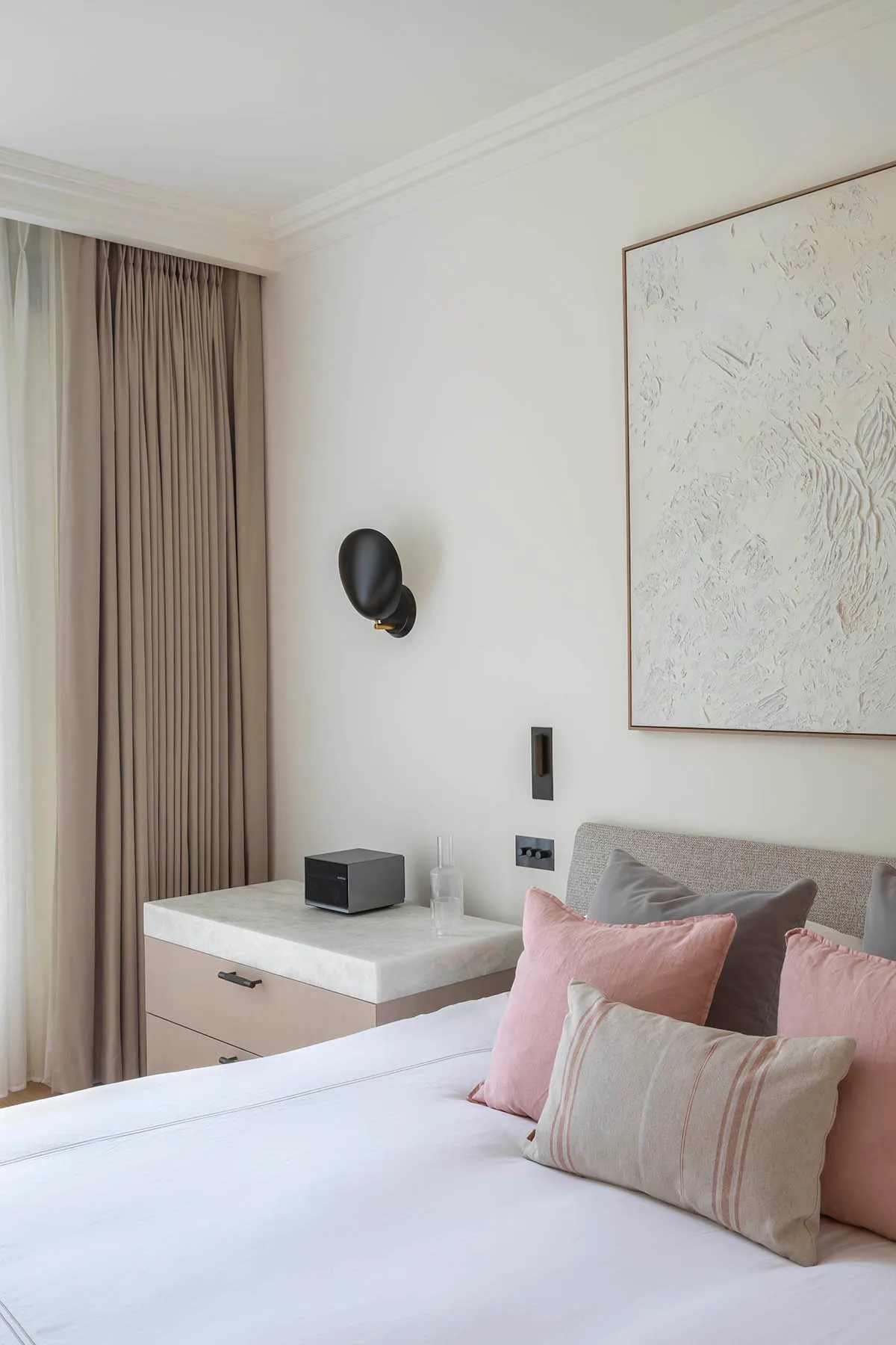 Principal bedroom with artwork above the bed