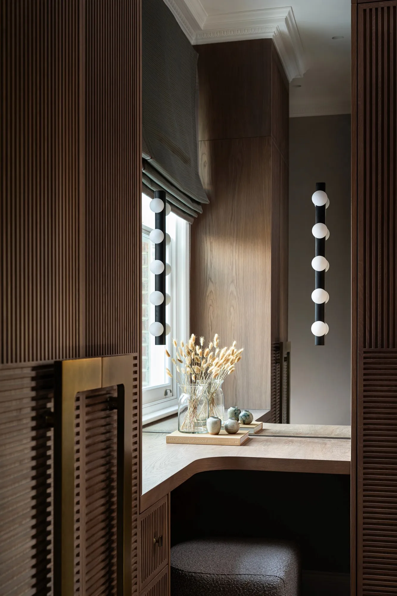 Fluted timber dressing area with marble top
