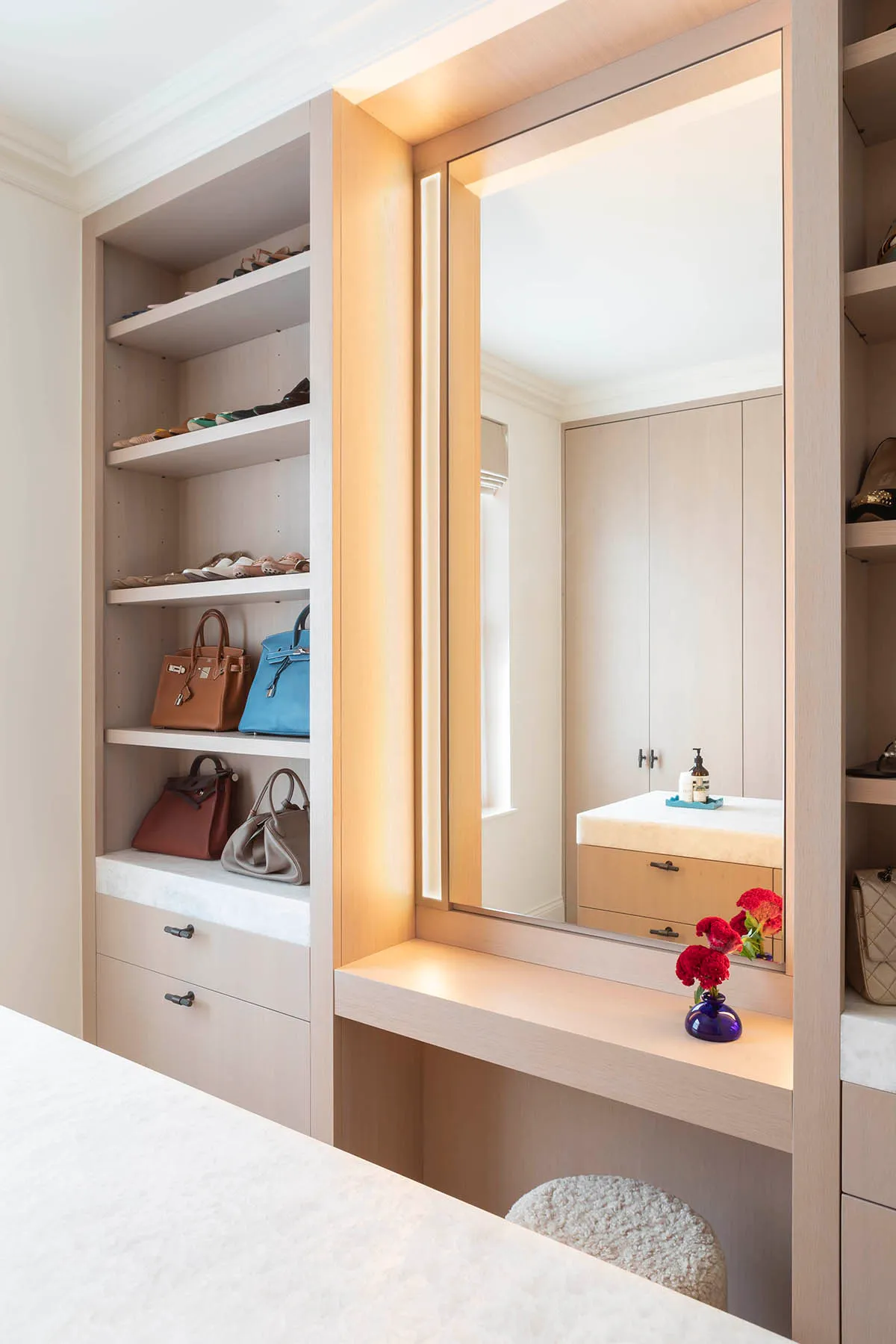 Lit dressing mirror and open shelving