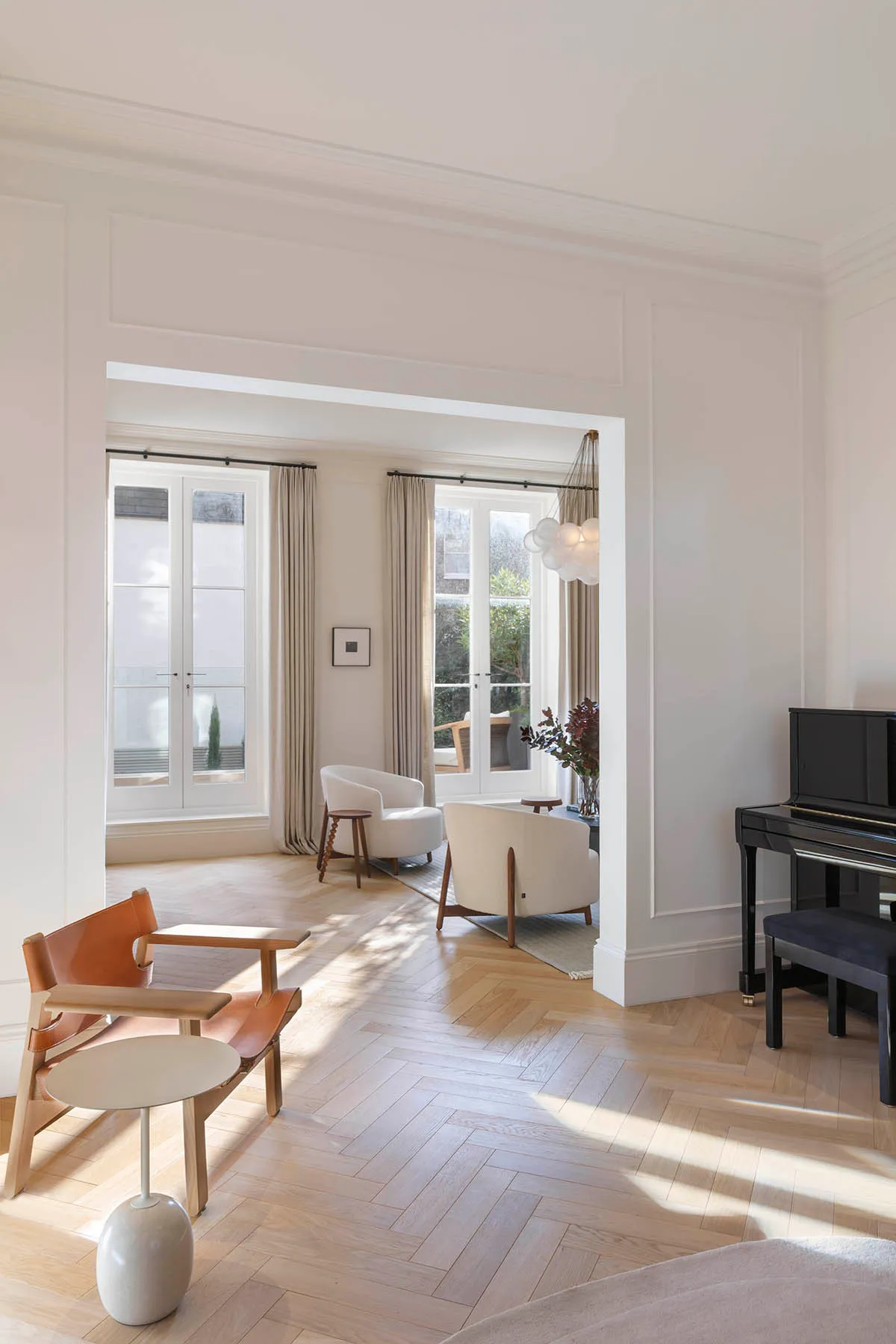 Sunlight across the herringbone floor