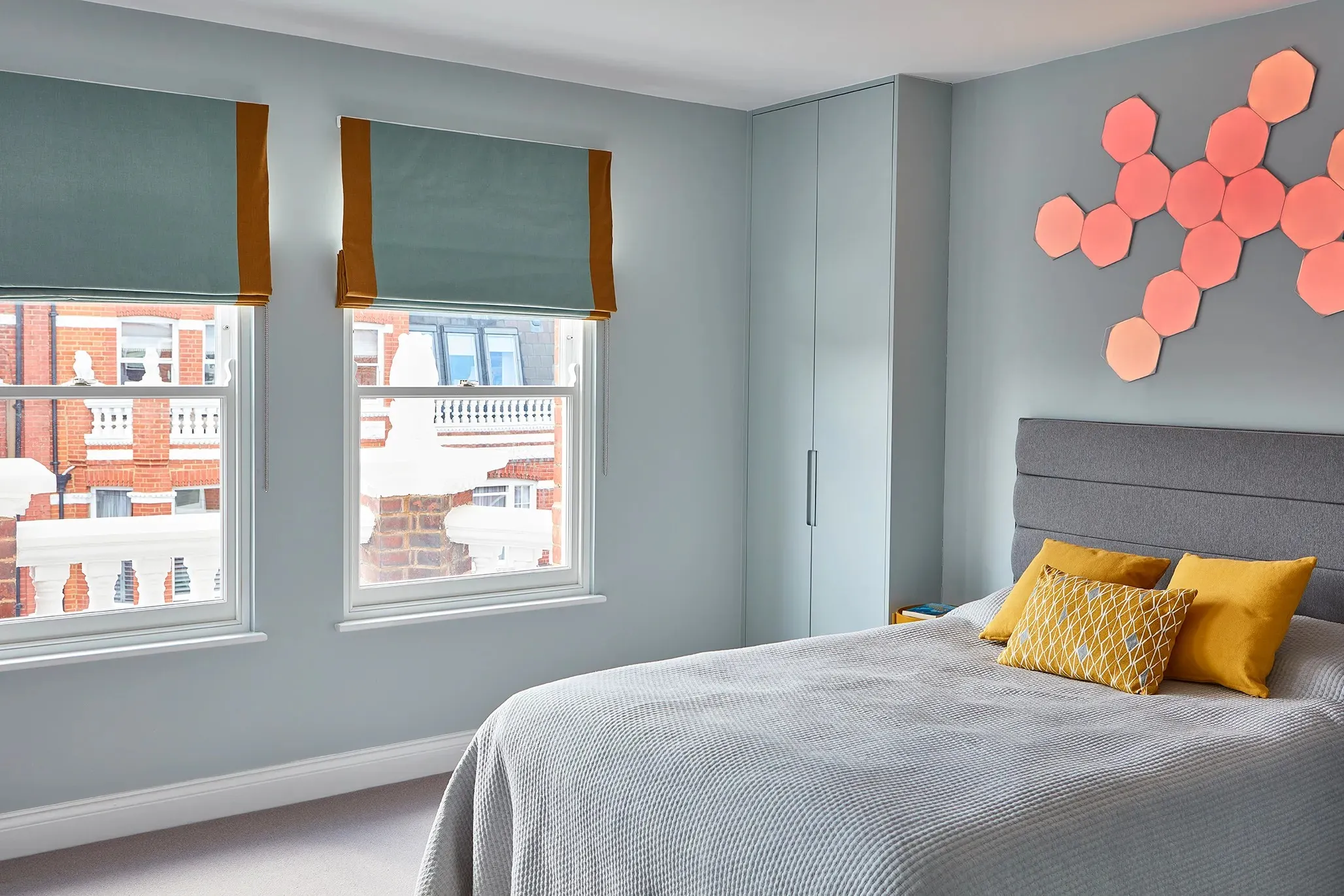 Child's bedroom with light panels above the bed