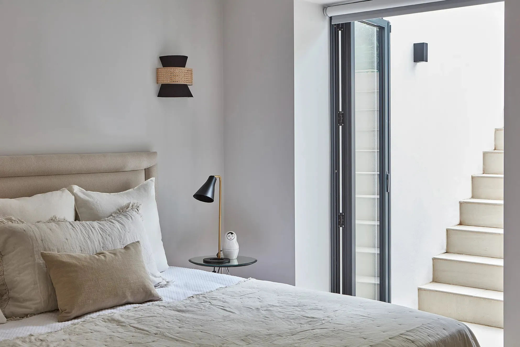 Basement bedroom beside the lightwell stair
