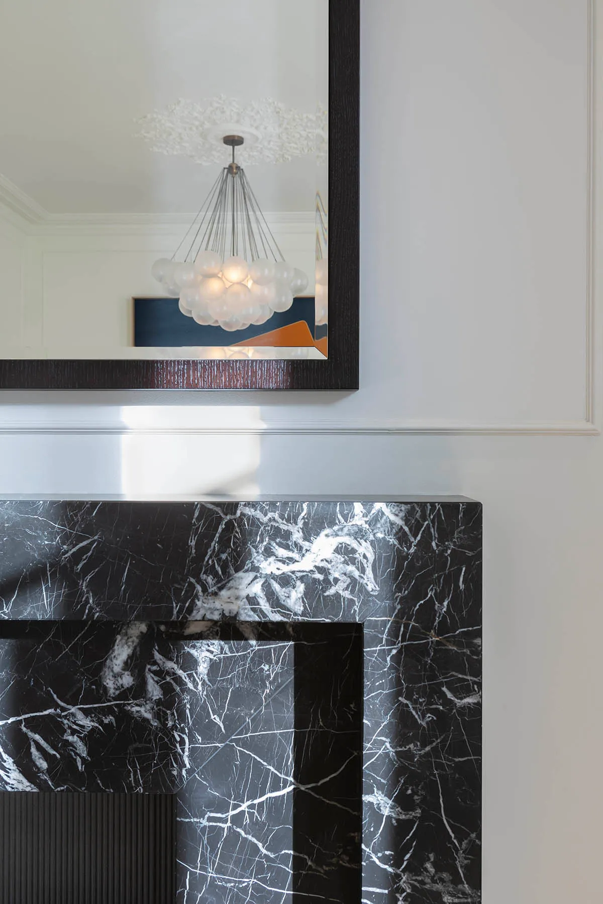 Fluted detail on the black marble surround
