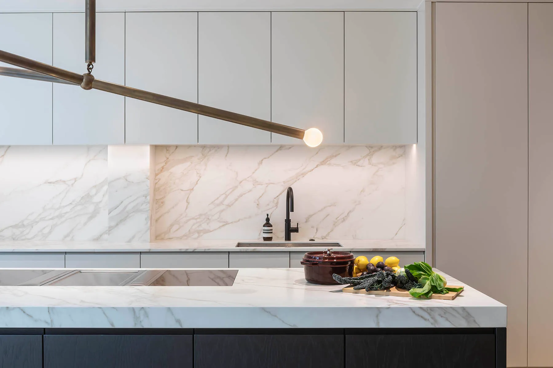 Marble worktop and brass pendant rail