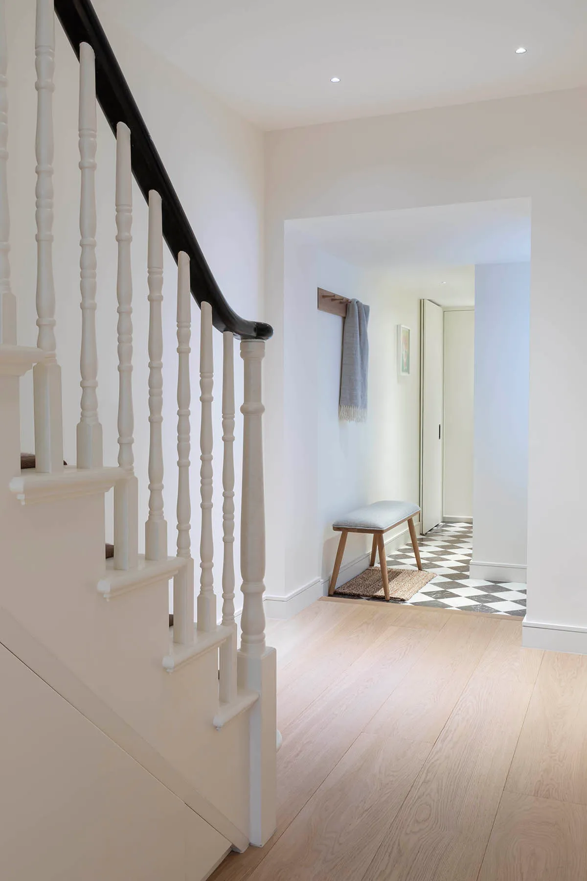 Hall stair with the chequered floor beyond